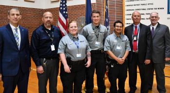 (L to R): Nebraska State College System Chancellor Dr. Paul Turman, Tecumseh State Correctional Institution Warden Todd Wasmer, Peru State College Officer Intern Cherise Womelsdorf, Peru State College Officer Intern Gabriel Stolinski, Peru State College Officer Intern Paw Wah, Nebraska Department of Correctional Services Director Scott R. Frakes, Peru State College President Dr. Michael Evans
