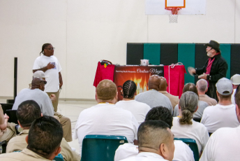 Magician performing with a volunteer