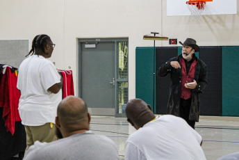 Magician performing with a volunteer