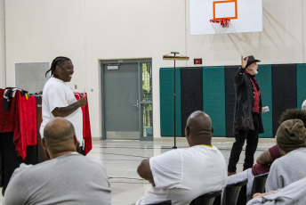 Magician performing with a volunteer